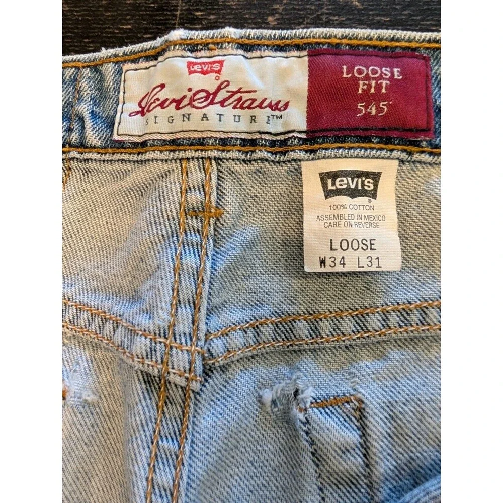 VTG Levi’s 545 Signature Loose Fit Jeans Mens 34x31 Baggy Light Wash Bronze Tab